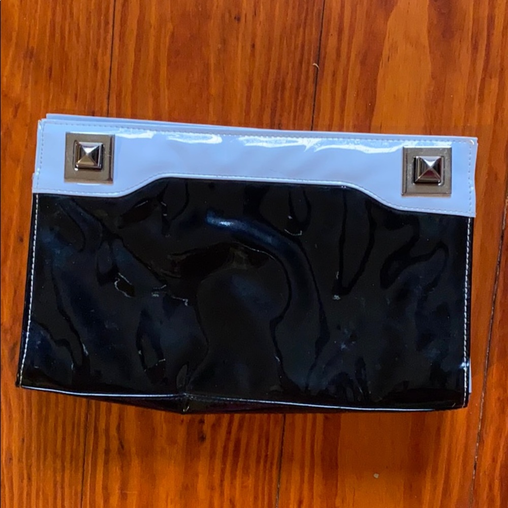 B. Bag black & white clutch purse vinyl patent EUC